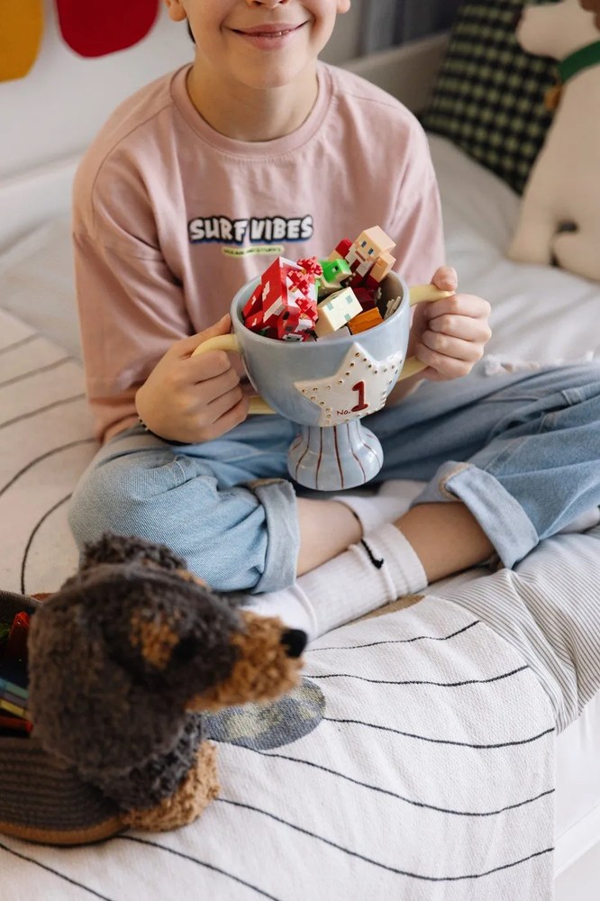 Coș de jucării pentru copii maro închis din material textil 59x16x23 cm Sparky – Lorena Canals