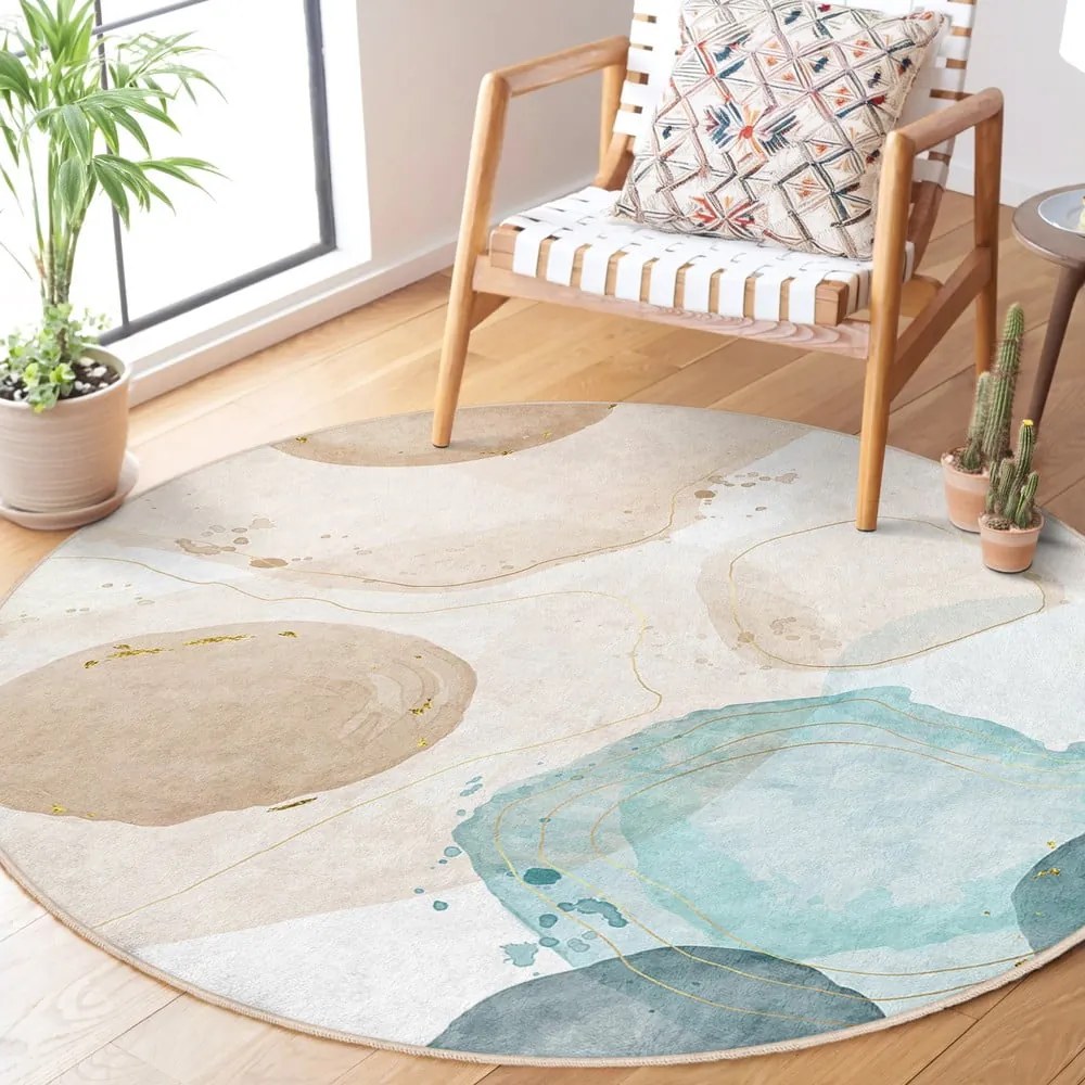 Covor albastru/bej lavabil rotund ø 150 cm Puddle – Mila Home