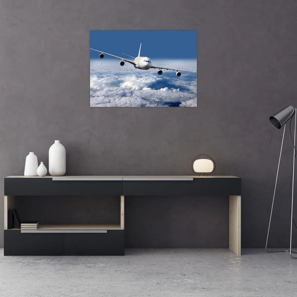 Tablou pe sticlă - Avion în nori (70x50 cm)