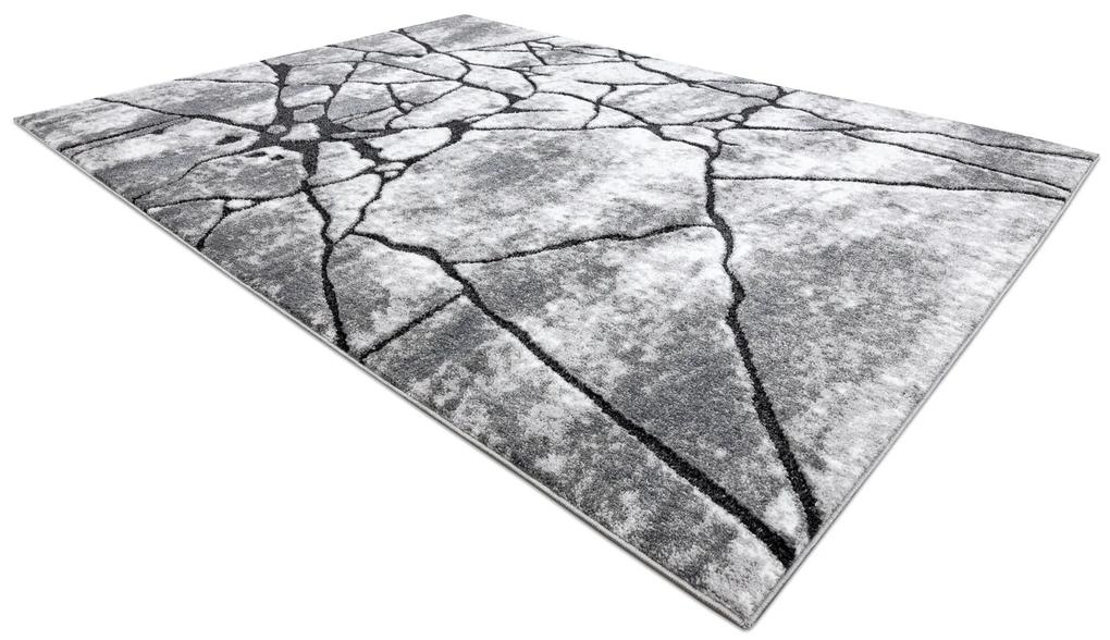 Covor modern COZY 8873 Cracks, beton crăpat - structural două niveluri de lână gri inchis