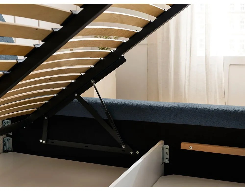 Pat matrimonial albastru închis tapițat cu spațiu de depozitare cu somieră 160x200 cm Orlane – Bobochic Paris