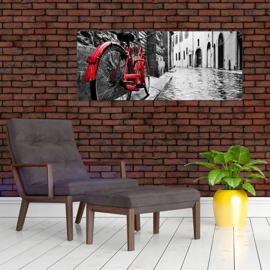 Tablou - Bicicleta roșie pe o stradă pavată (120x50 cm)