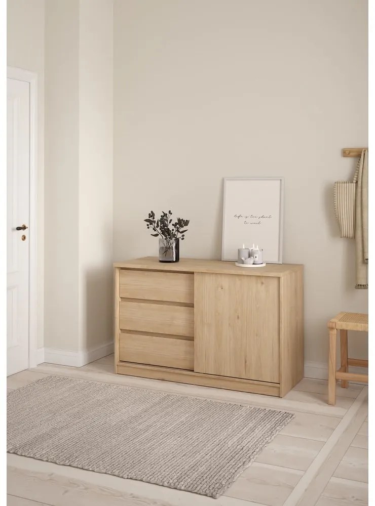 Comodă în culoare naturală cu aspect de lemn de stejar cu ușă glisantă 119x76x50 cm Naia – Tvilum