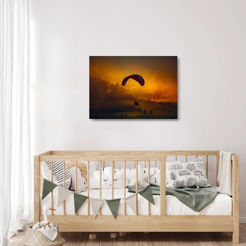 Tablou pe sticlă cu parașutistul în apus de soare (70x50 cm)