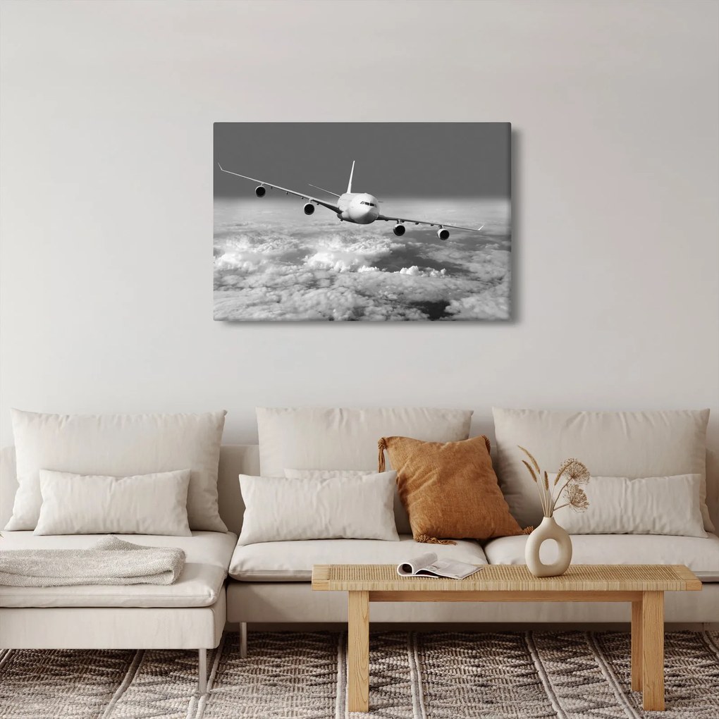 Tablou - Avion în nori, alb și negru (90x60 cm)