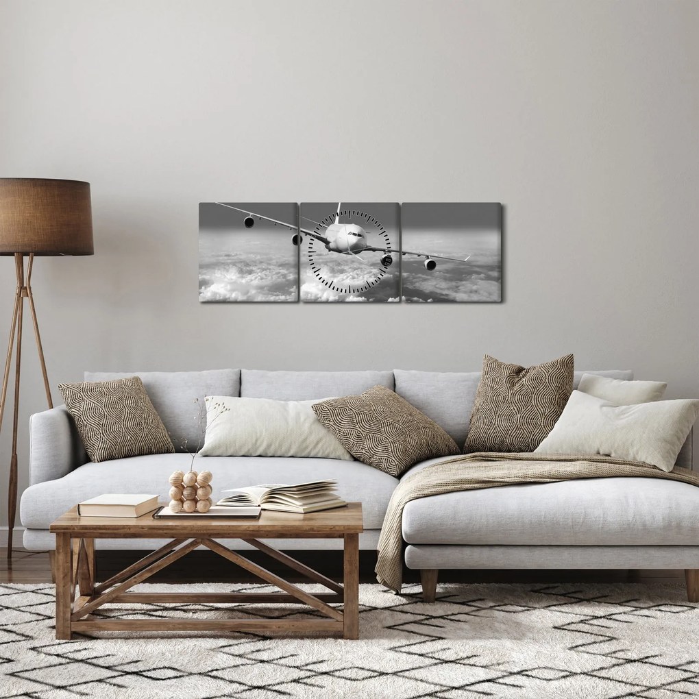 Tablou - Avion în nori, alb și negru (cu ceas) (90x30 cm)