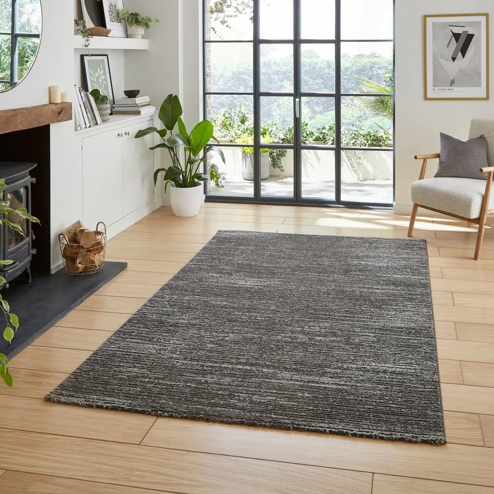 Covor gri închis lavabil din fibre reciclate 120x170 cm Flores – Think Rugs