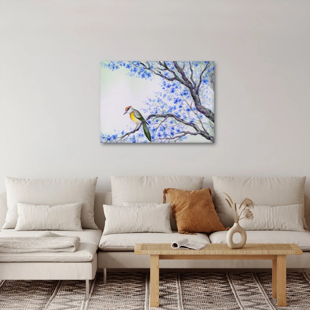 Tablou - Pasăre pe un copac cu flori albastre (70x50 cm)