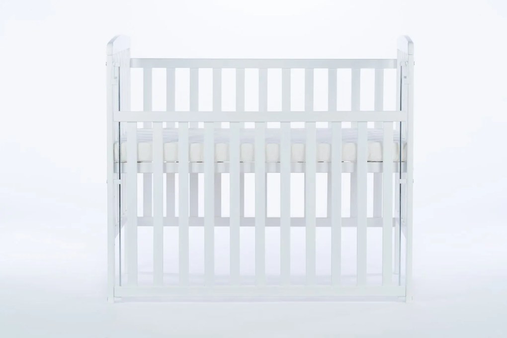 Patut bebe din lemn masiv, laterala culisabila si inaltime reglabila a saltelei, bedside Alice Alb cu saltea comfort 100x50 cm