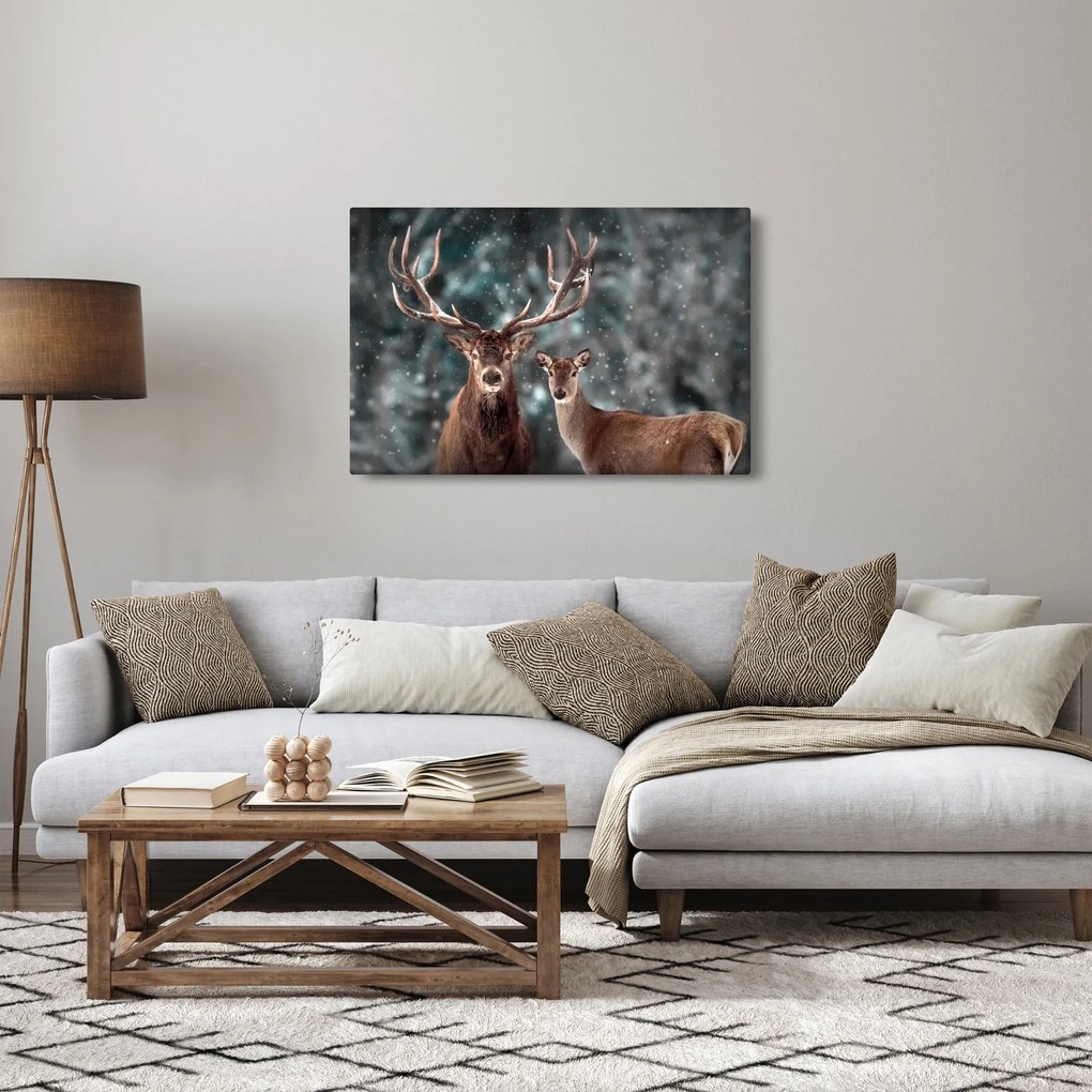 Tablou - Cerb și căprioare în pădurea înzăpezită (90x60 cm)
