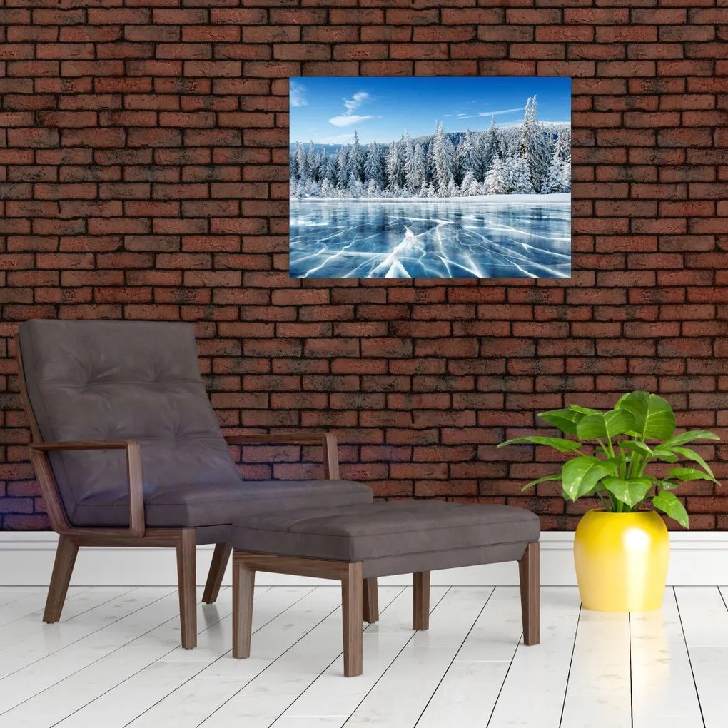 Tablou pe sticlă cu lacul înghețat și copacii înzăpeziți (70x50 cm)