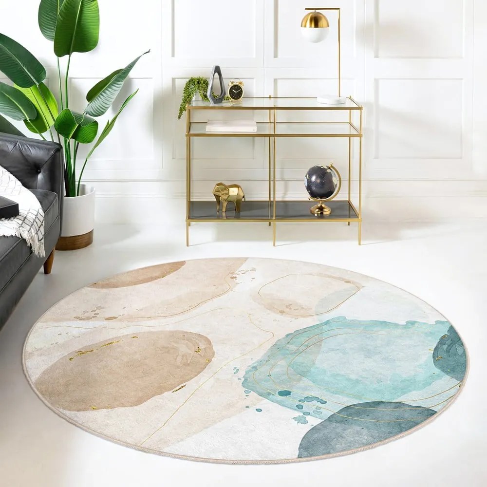 Covor albastru/bej lavabil rotund ø 80 cm Puddle – Mila Home