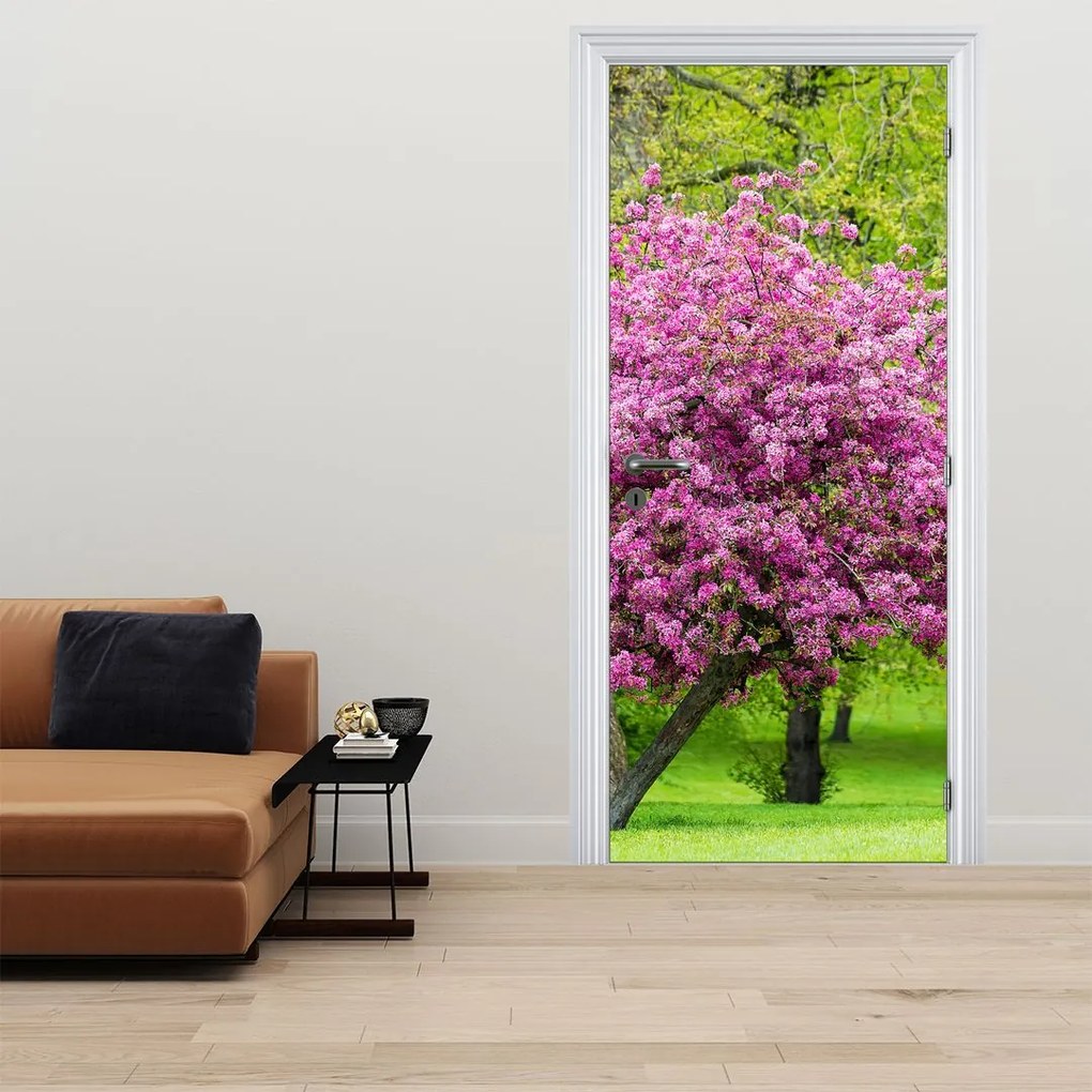 Fototapet pentru ușă - Copac înflorit în pajiște (95x205cm)