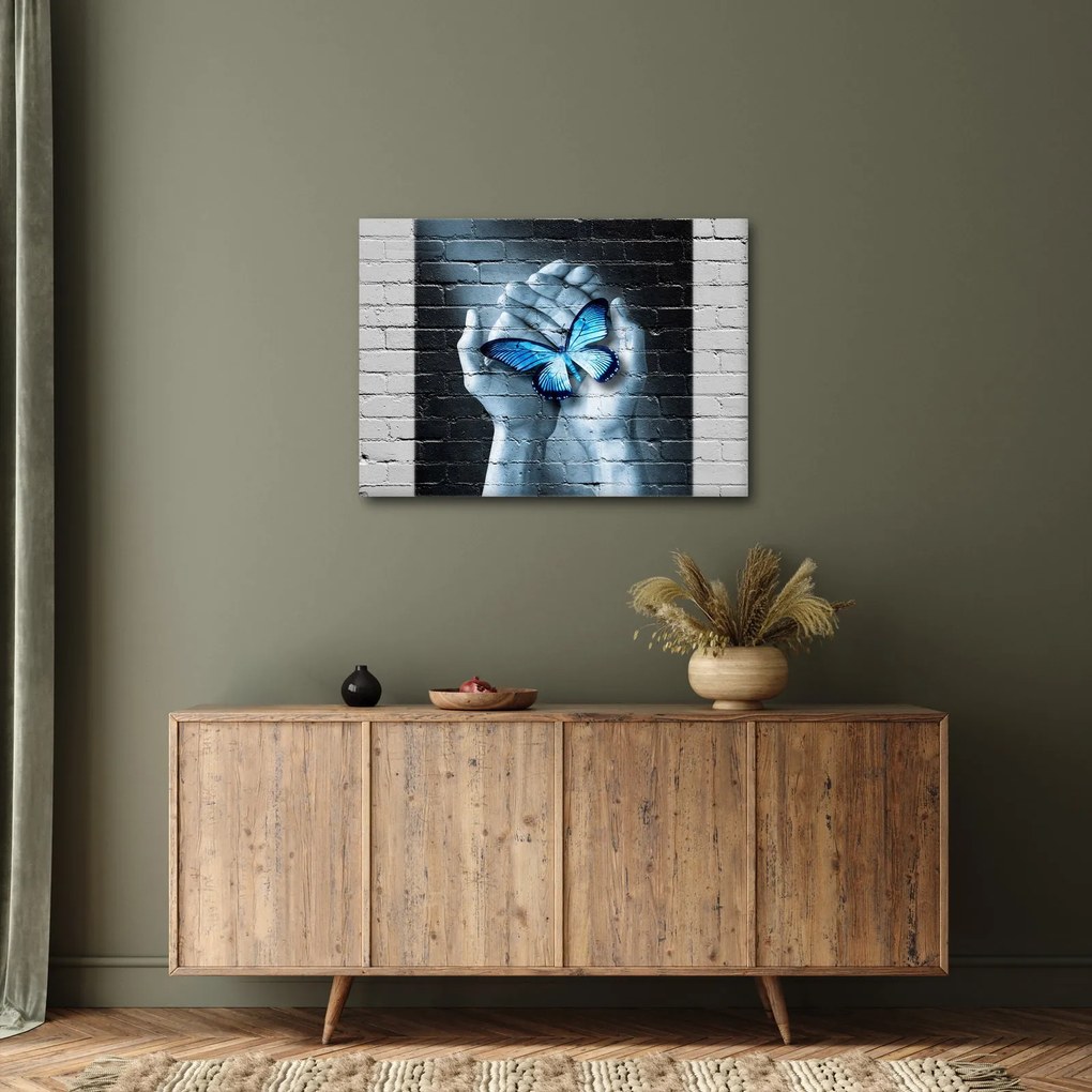 Tablou cu flutere albastru pe perete (70x50 cm)