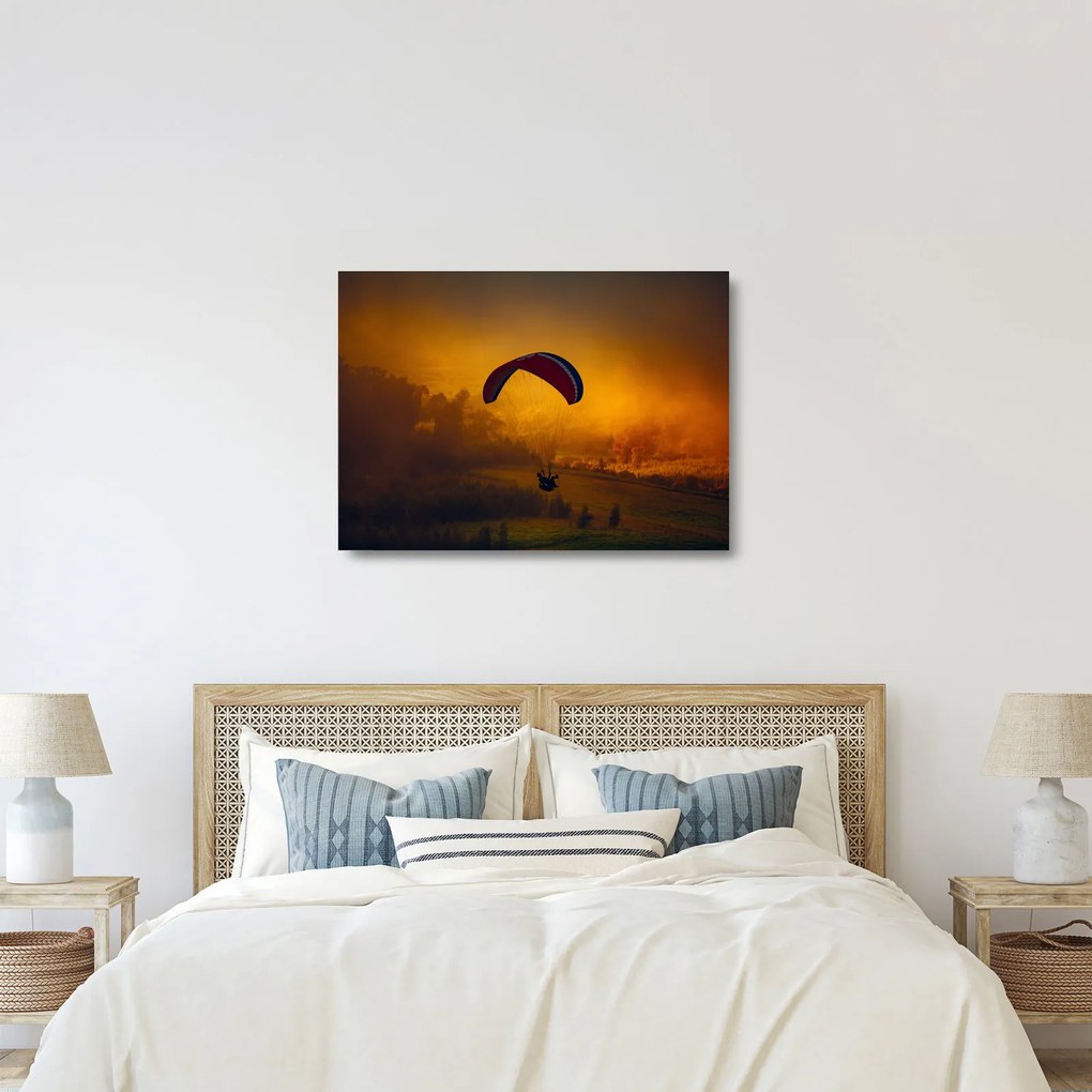 Tablou pe sticlă cu parașutistul în apus de soare (70x50 cm)