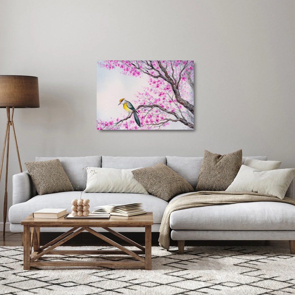 Tablou pe sticlă - Pasăre pe un copac cu flori roz (70x50 cm)