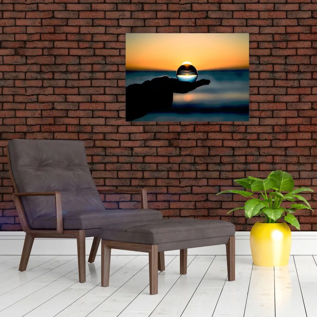 Tabloul cu bilă din sticlă în palmă (70x50 cm)