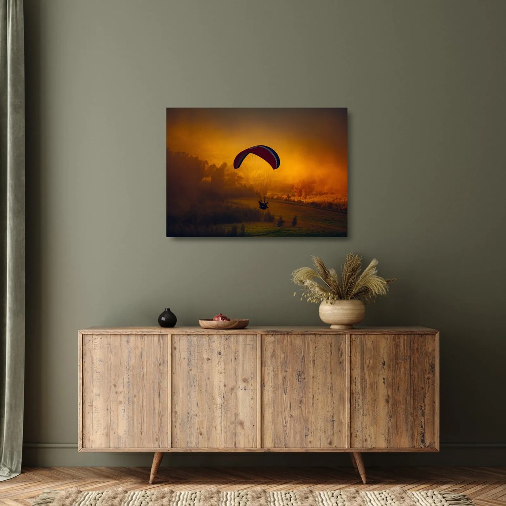 Tablou pe sticlă cu parașutistul în apus de soare (70x50 cm)