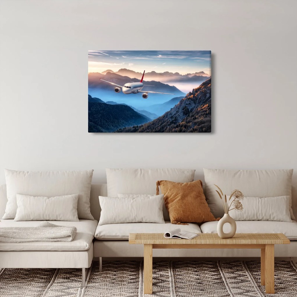 Tablou - Avion peste crestele montane (90x60 cm)