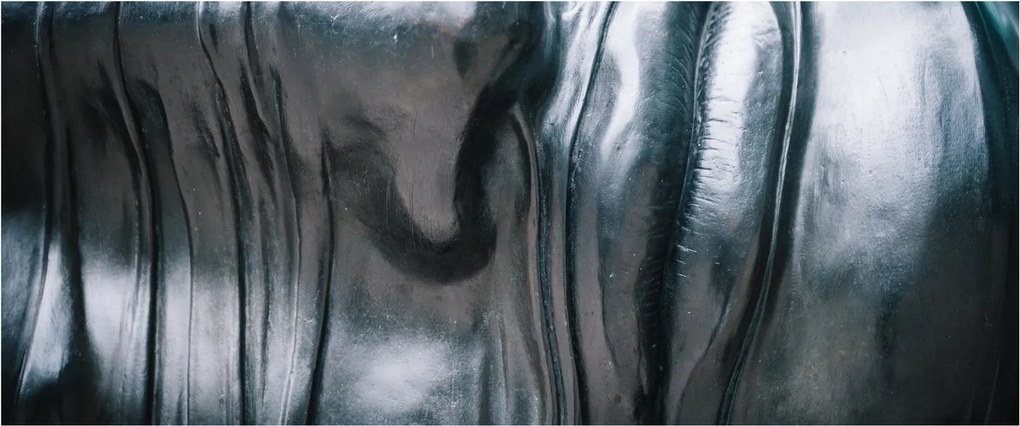 Tablou - Fața din oțel (120x50 cm)