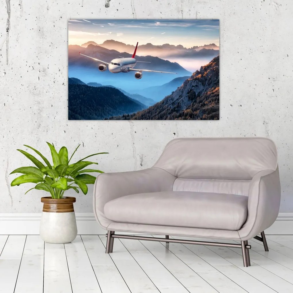 Tablou - Avion peste crestele montane (90x60 cm)