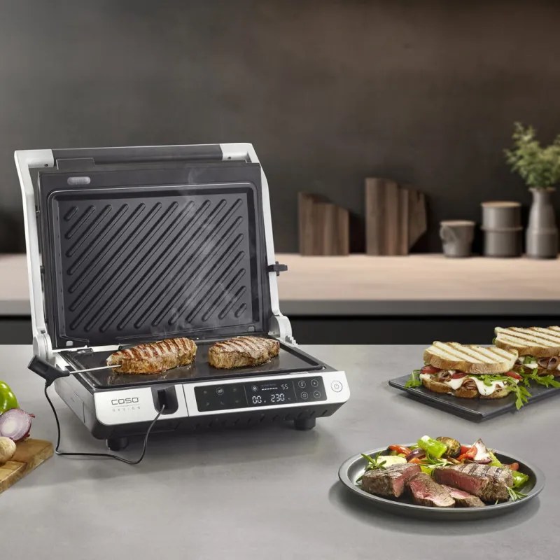 Gratar electric 3 în 1 Caso Germany SteakMaster Pro, 2000 W, 34 x 24 cm, 80-240°C, Acoperire ceramica, Timer, Comanda tactila, Inox/Negru