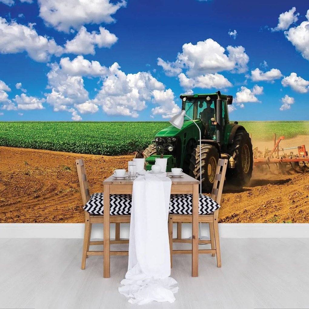 Fototapet - Tractor verde pe teren (254x184 cm)