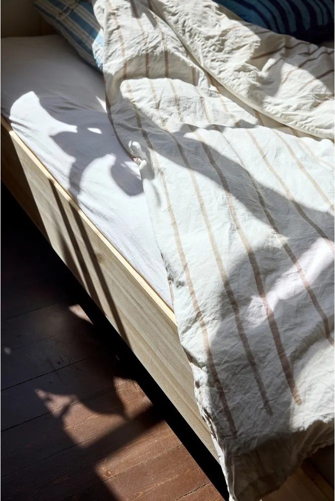 Pat în culoare naturală din lemn de pin fără tăblie cu somieră 90x200 cm Merge – Karup