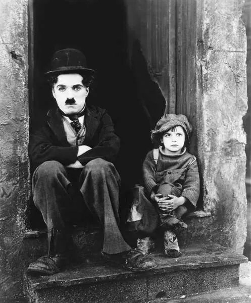 Fotografie Charles Chaplin And Jackie Coogan