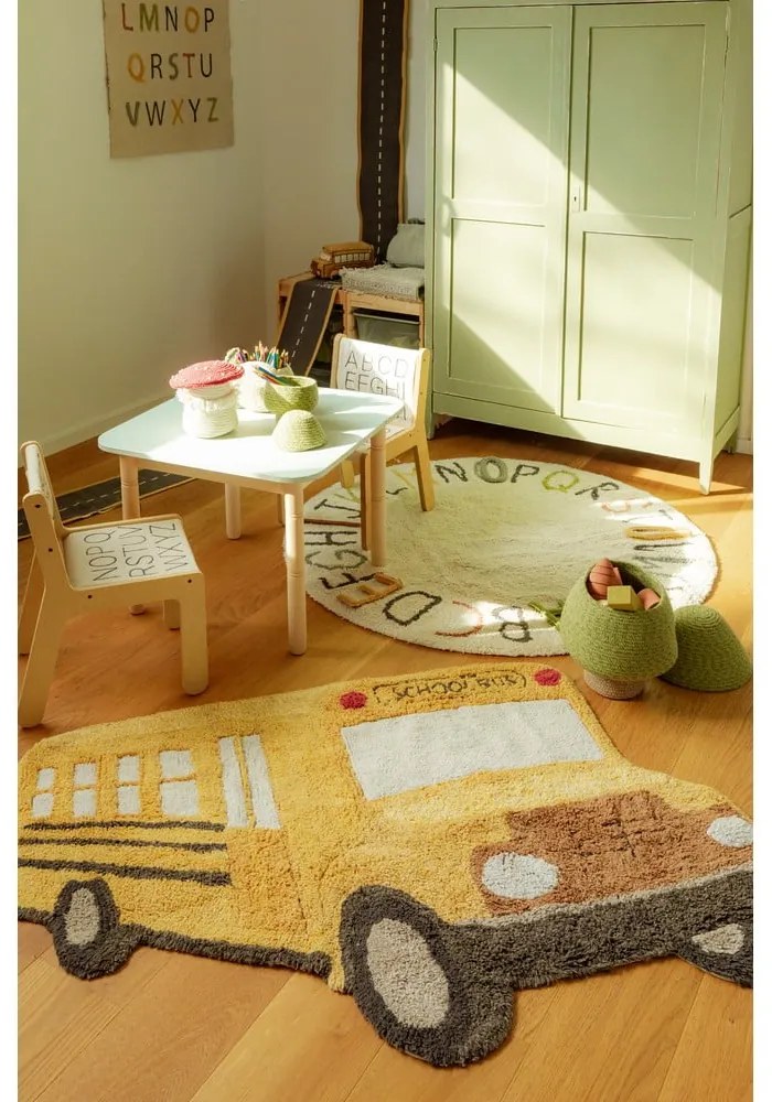 Covor pentru copii galben ocru lavabil, țesut manual din bumbac 90x130 cm School Bus – Lorena Canals