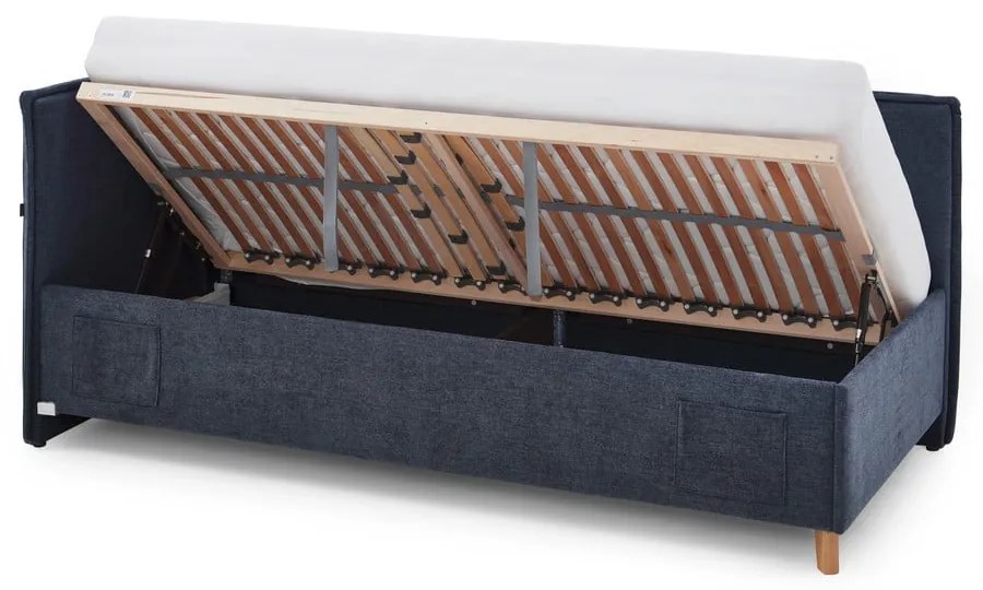 Pat pentru copii albastru închis pe colț tapițat cu spațiu de depozitare cu somieră 90x200 cm Fun – Meise Möbel