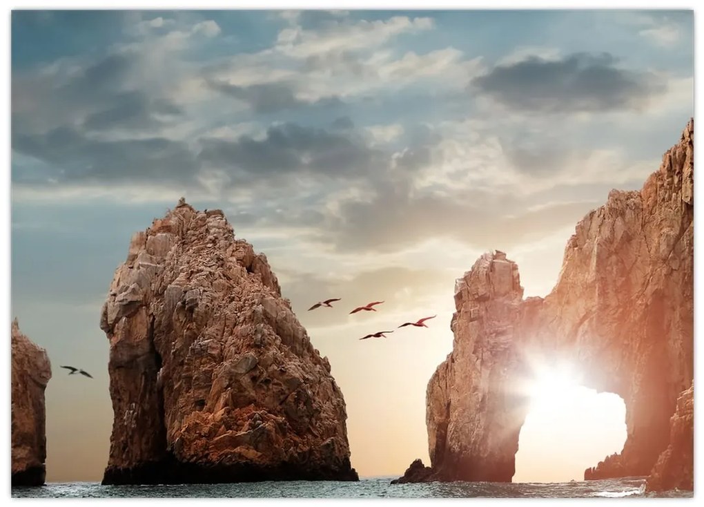 Tablou pe sticlă - Apus de soare peste stânci (70x50 cm)