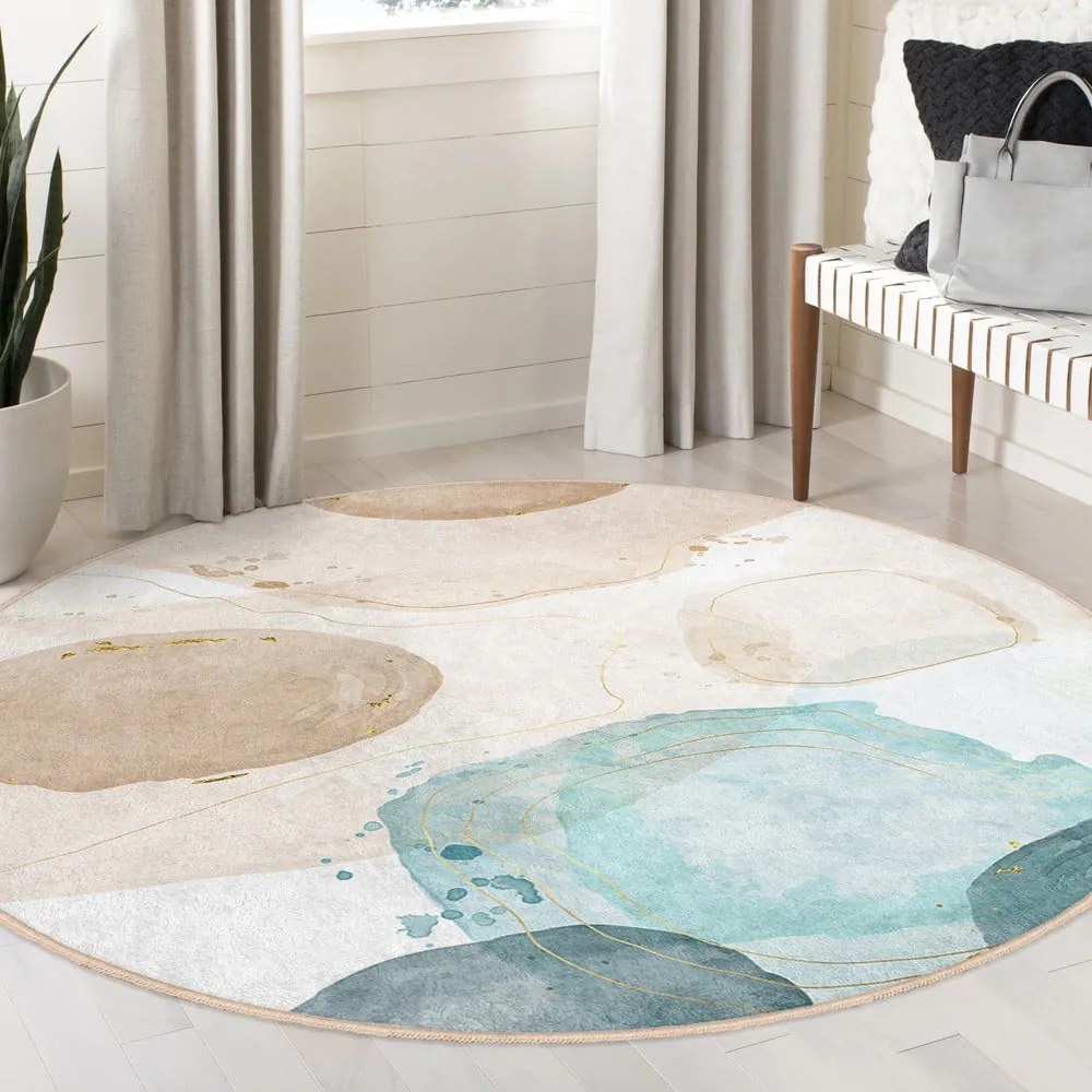 Covor albastru/bej lavabil rotund ø 150 cm Puddle – Mila Home