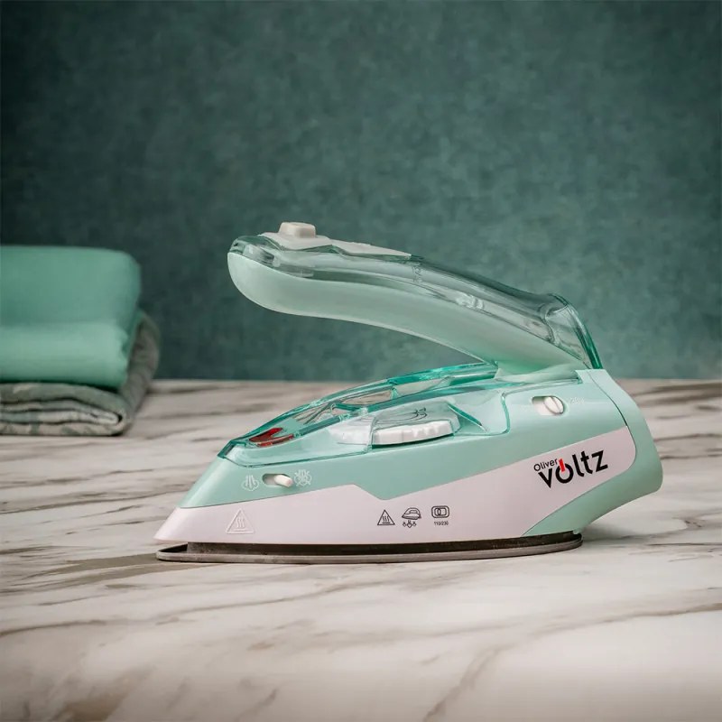 Fier de calcat pentru voiaj Oliver Voltz OV51050K, 1100W, 55 ml, Pliabil, Protectie la supraincalzire, Turcoaz/alb