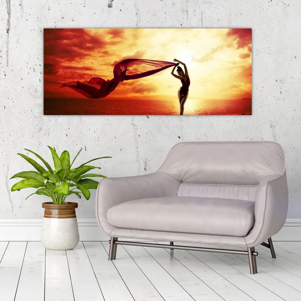 Tablou - Silueta femeii la apus de soare (120x50 cm)