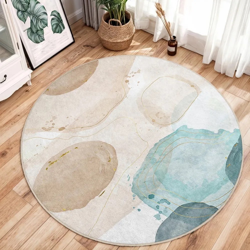 Covor albastru/bej lavabil rotund ø 150 cm Puddle – Mila Home