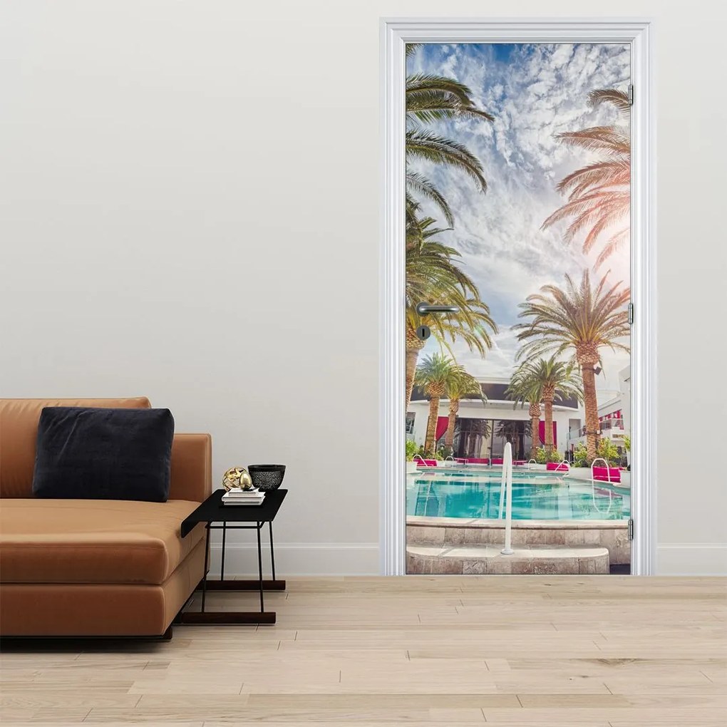 Fototapet pentru ușă - Palmieri și piscină (95x205cm)