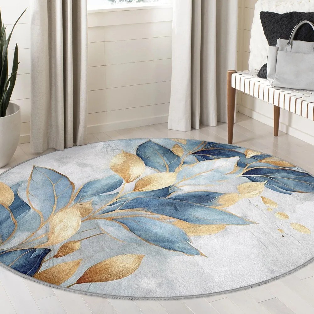 Covor albastru/auriu lavabil rotund ø 120 cm Golden Leaves – Mila Home