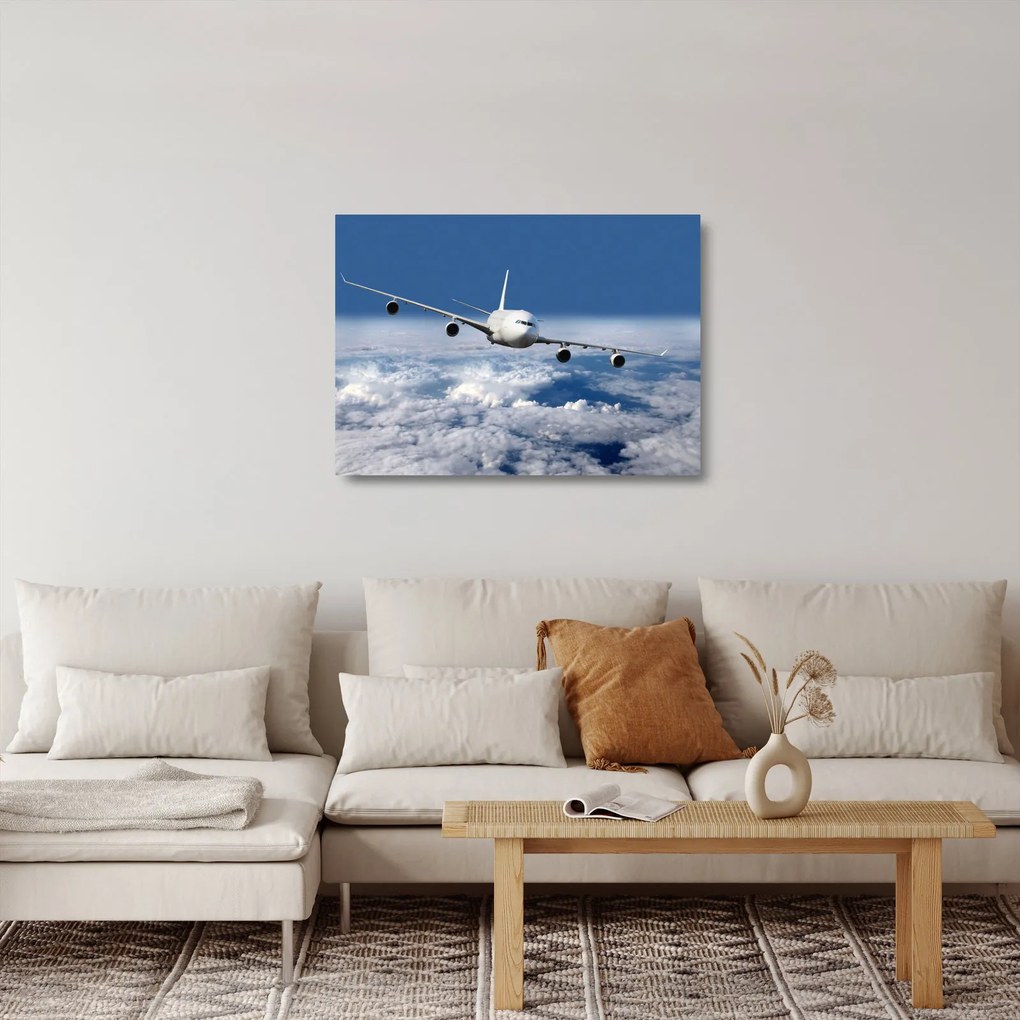Tablou pe sticlă - Avion în nori (70x50 cm)