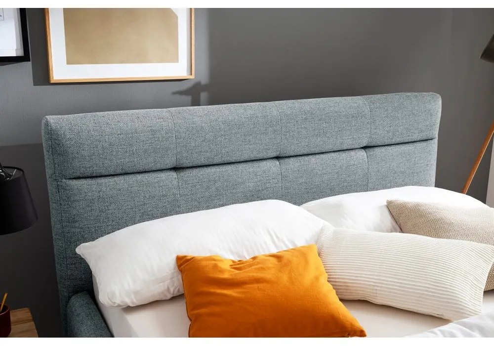 Pat matrimonial albastru prăfuit tapițat cu spațiu de depozitare cu somieră 140x200 cm Lotte – Meise Möbel