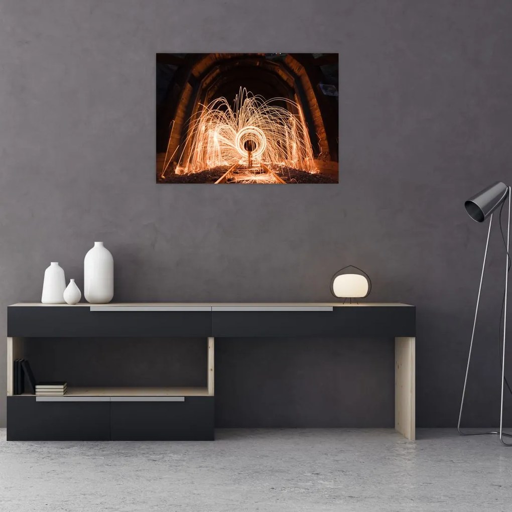 Tablou pe sticlă - Show de lumini deasupra șinelor (70x50 cm)