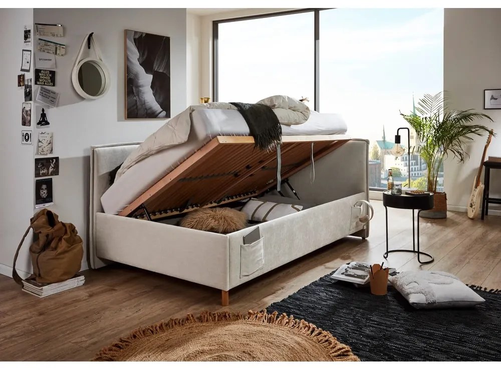 Pat pentru copii bej pe colț tapițat cu spațiu de depozitare cu somieră 90x200 cm Fun – Meise Möbel