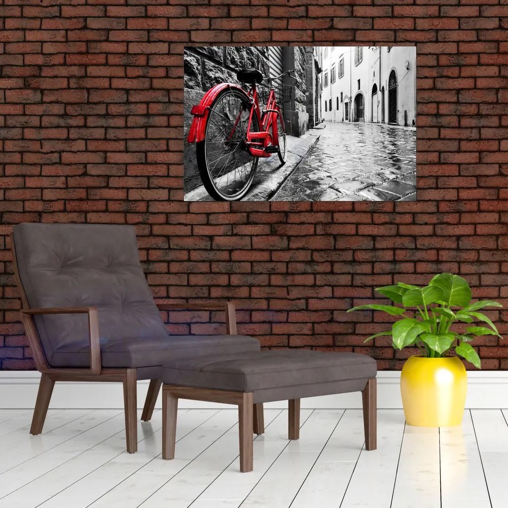 Tablou - Bicicleta roșie pe o stradă pavată (90x60 cm)
