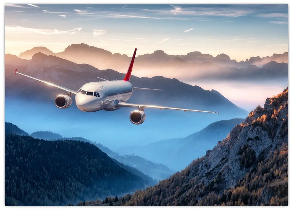 Tablou pe sticlă - Avion peste crestele montane (70x50 cm)