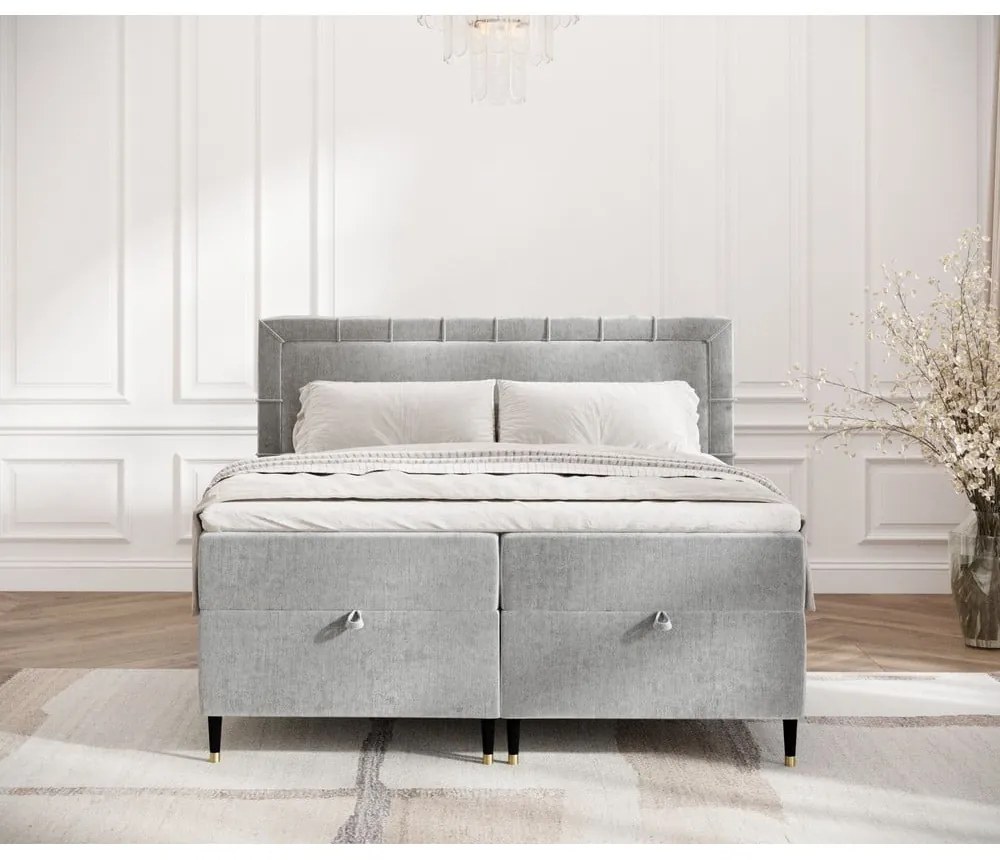 Pat boxspring gri deschis cu spațiu de depozitare 180x200 cm Voyage – Maison de Rêve