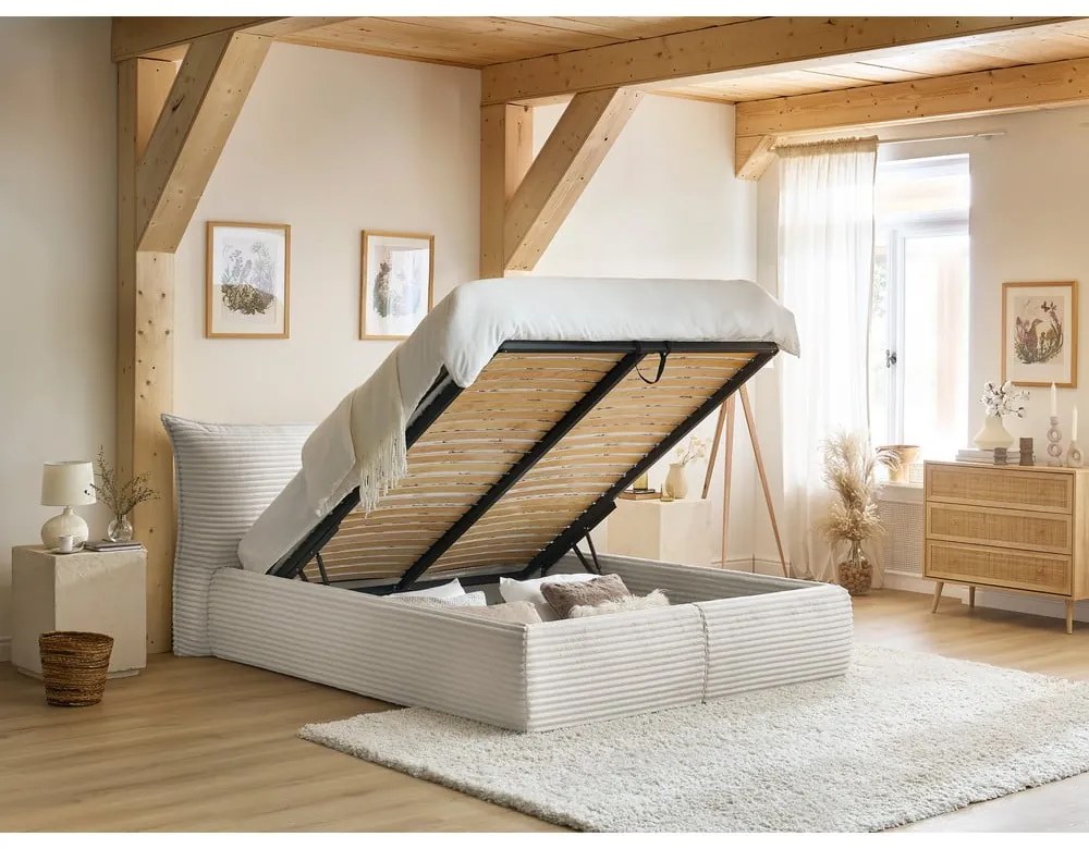 Pat matrimonial crem tapițat cu spațiu de depozitare cu somieră 160x200 cm Jade – Bobochic Paris