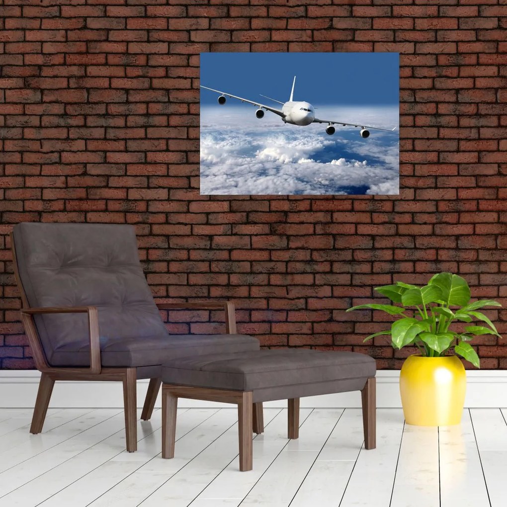 Tablou pe sticlă - Avion în nori (70x50 cm)
