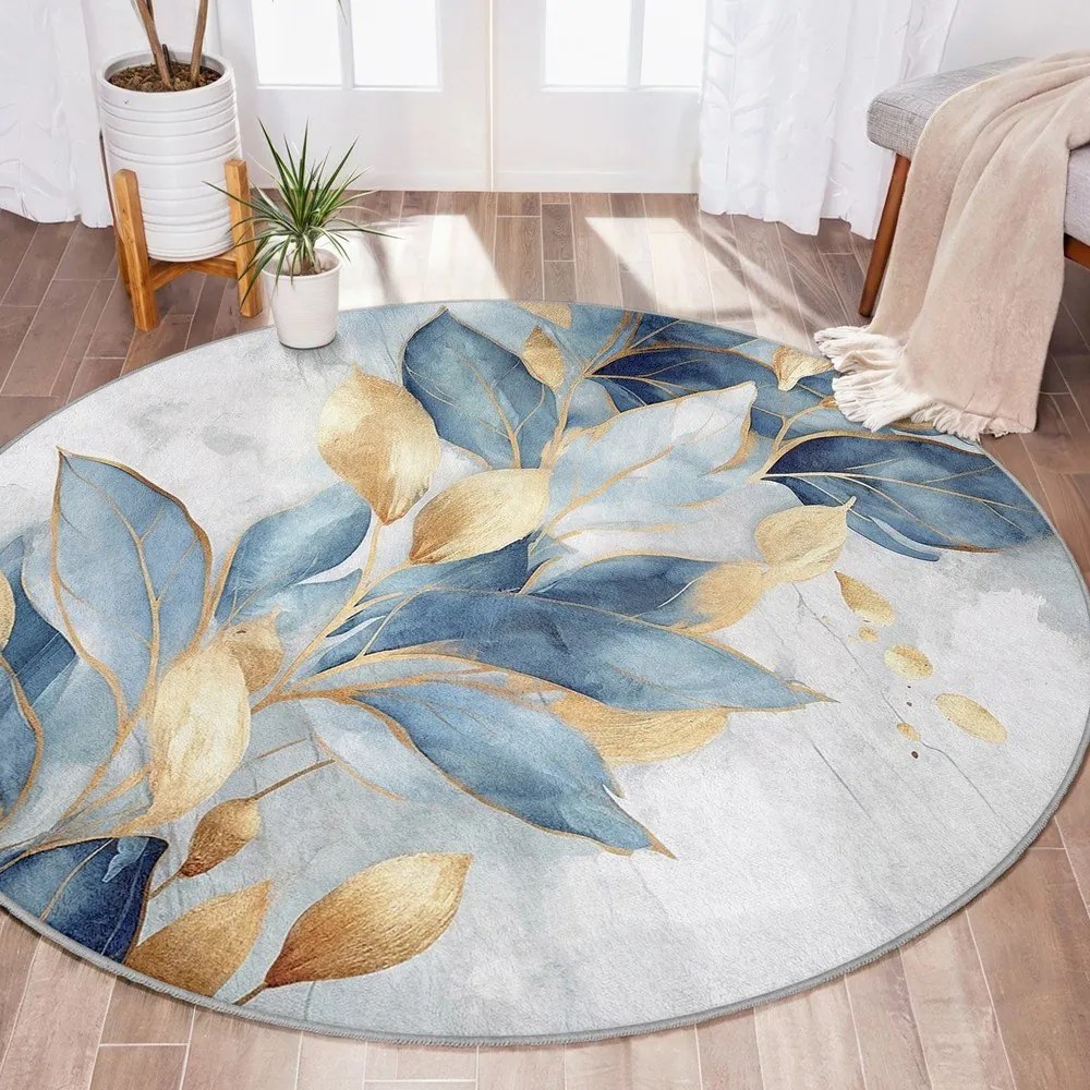 Covor albastru/auriu lavabil rotund ø 120 cm Golden Leaves – Mila Home