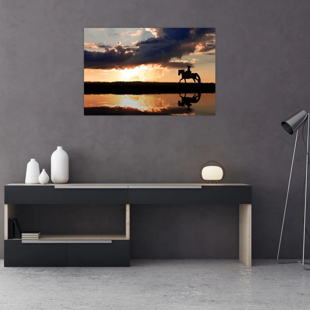 Tablou - Rider pe un cal la apus de soare (90x60 cm)