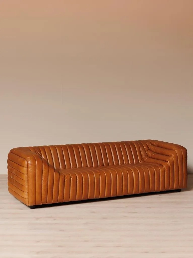 Canapea 3 locuri retro din piele naturală cognac, cu capitonaj în canale verticale și brațe în trepte, 63 x 249 x 98 cm, „Freud”